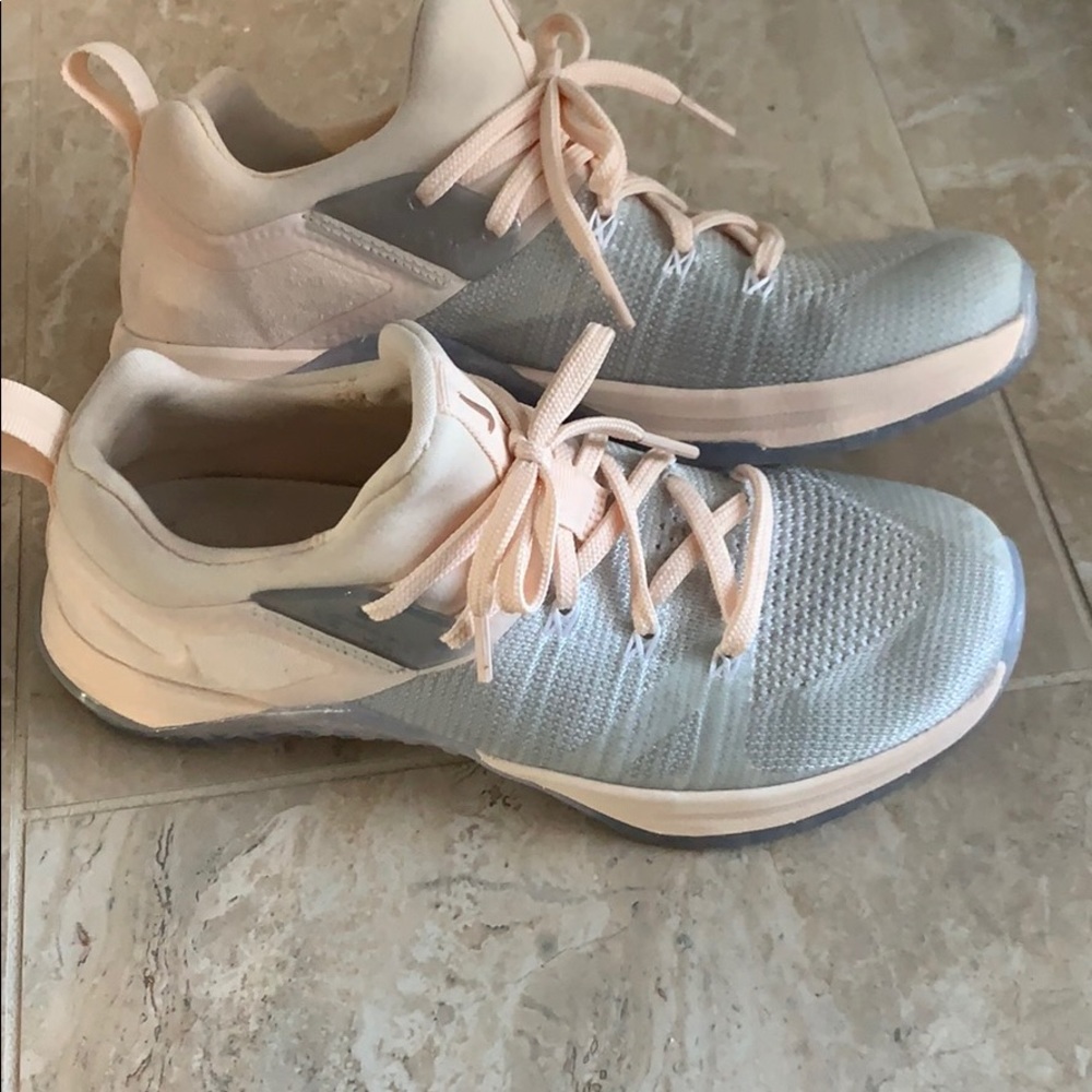 Women’s Metcon pink and gray running shoes
